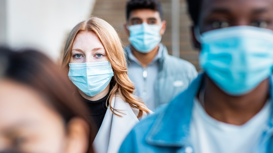 Woman Masked Crowd Blurred City