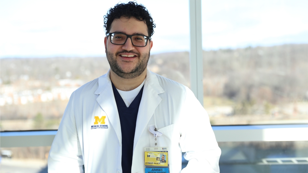 medical doctor smiling glasses brown hair