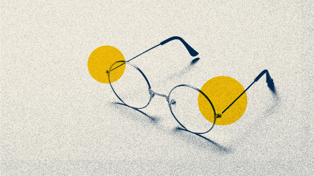 eye glasses blue two yellow dots 