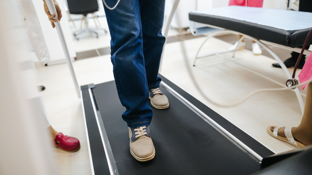 person walking on treadmill