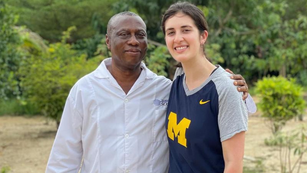 Two people smiling posing for the camera