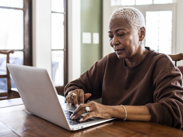 older woman on laptop