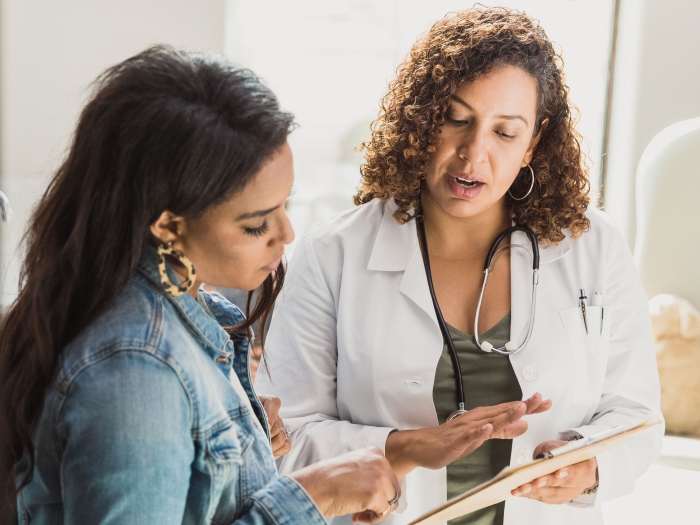 doctor with patient talking