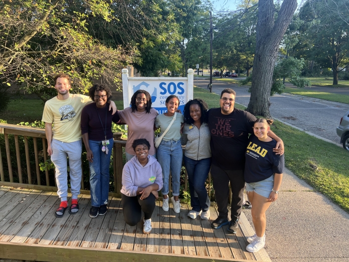 A group of students from the Black Medical Association at the SOS Food Pantry, where they volunteered