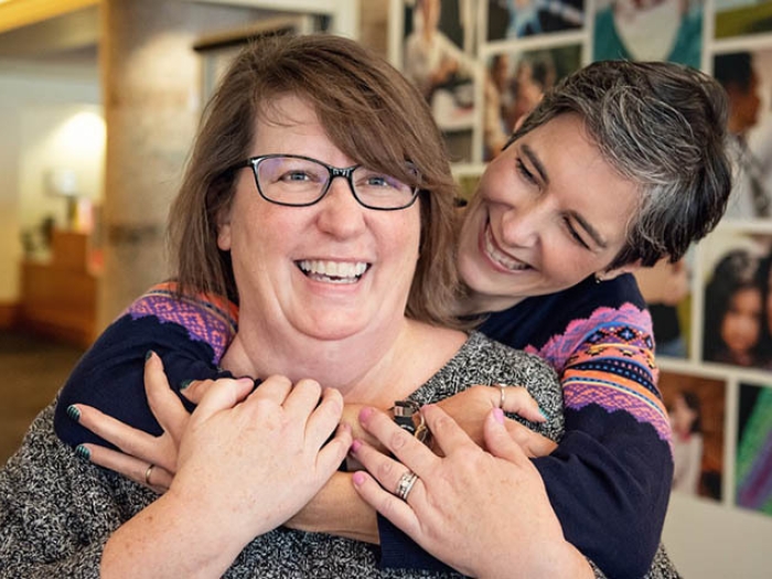 Patients hugging.