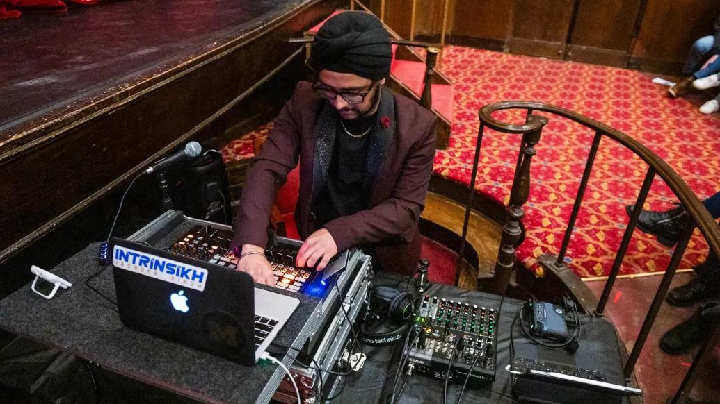Jasnoor working with AV equipment