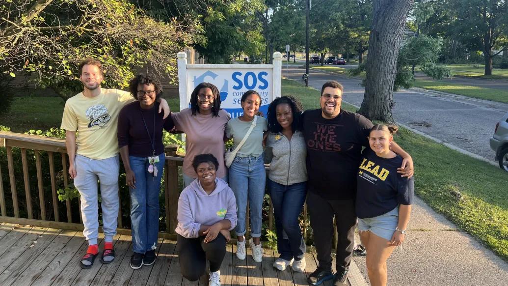 A group of students from the Black Medical Association at the SOS Food Pantry, where they volunteered