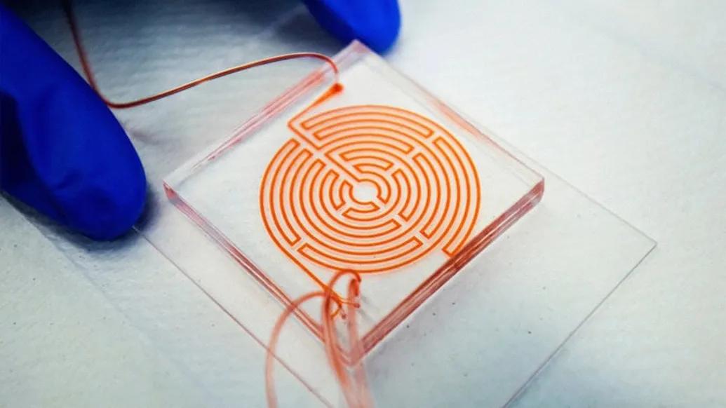 puzzle looking string of orange with lab gloves blue