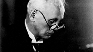 historic photo of Novy with glasses on