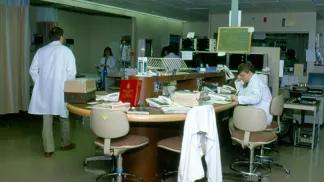 Physicians sitting at desk in the hospital unit