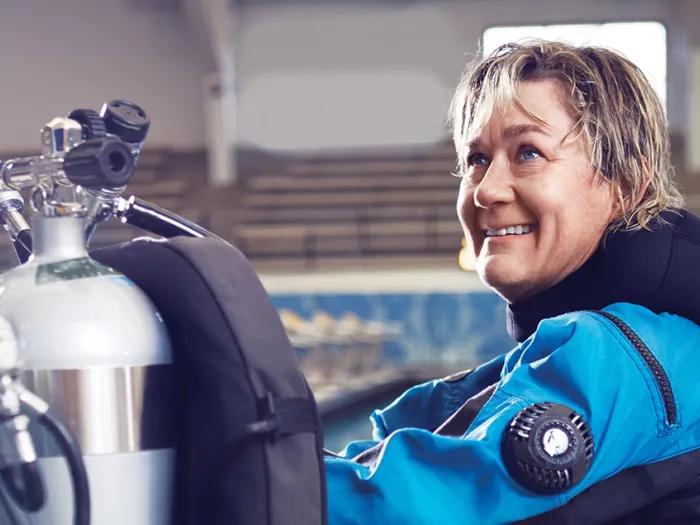 Meredith smiles while wearing her scuba gear