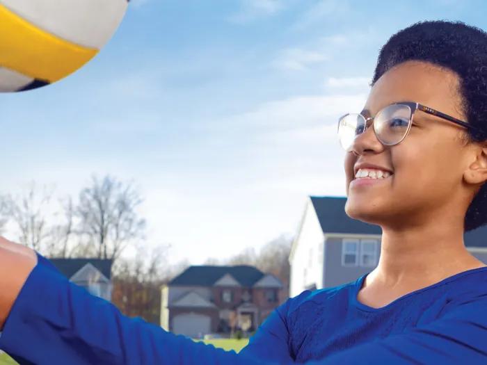 Akylah Marshall playing with a volleyball