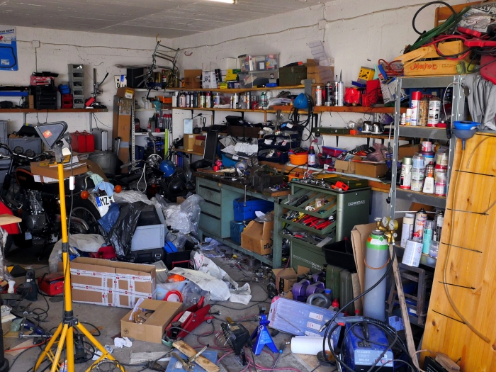 Photo of a cluttered, messy garage