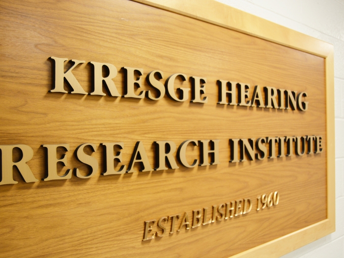 Photo of the Kresge Hearing Research Institute wooden sign