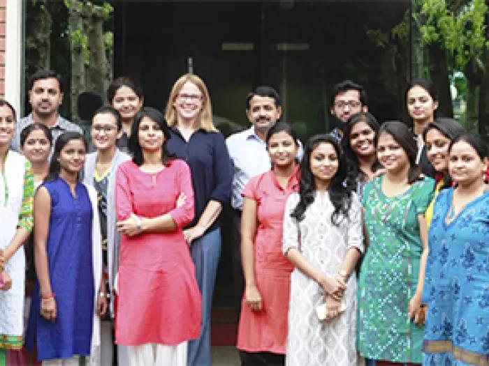 A group of people smiling for the camera