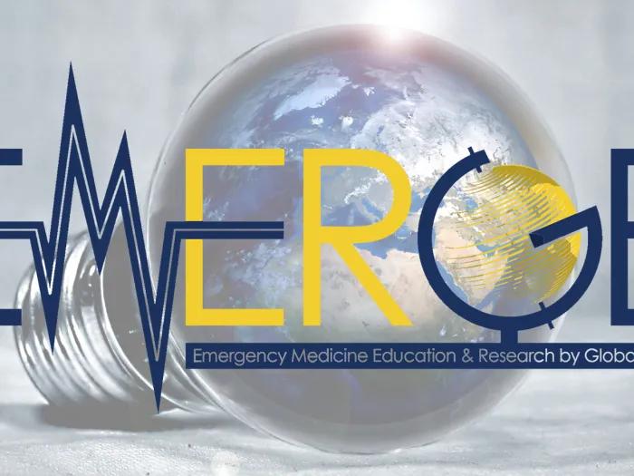 Graphic of a black and white photo of a lightbulb, with the word 'Emerge' written in the foreground in maize and blue. The M looks like a pulse line on an EKG, while the G is tilted slightly
