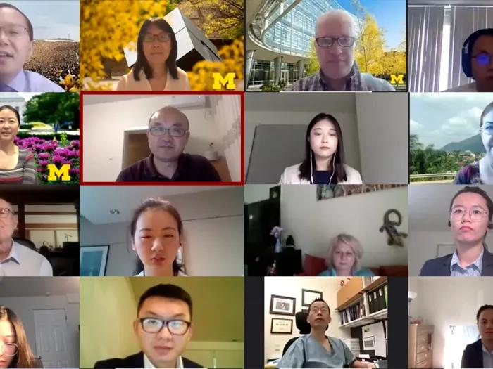 Screenshot of a Zoom call with sixteen people 