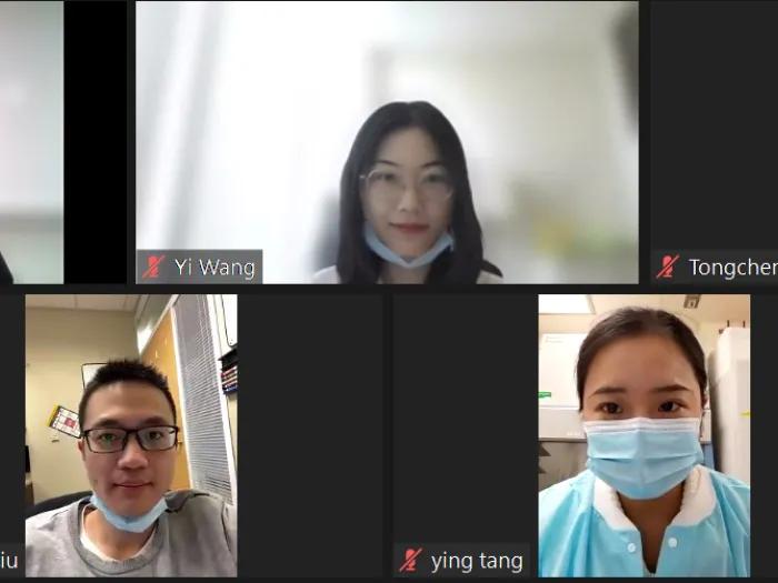 Five people on a Zoom video-call 