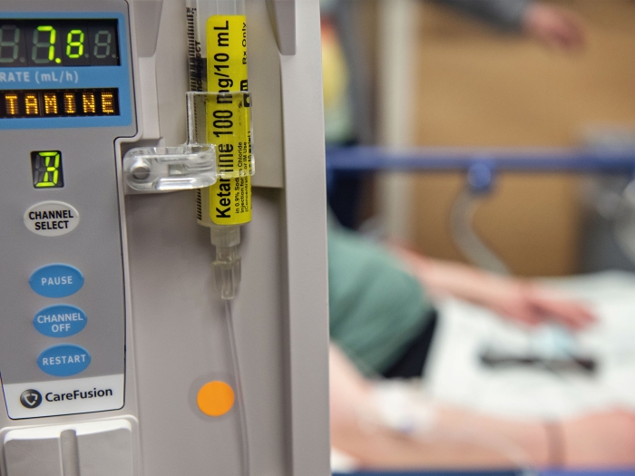 ketamine pump stock picture close up showing number grey blue yellow blurred background behind it