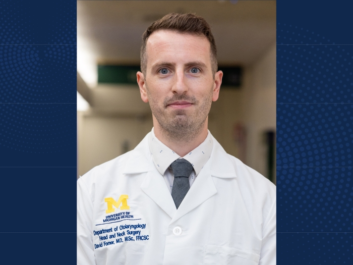 Headshot of David Forner MD on a navy blue background