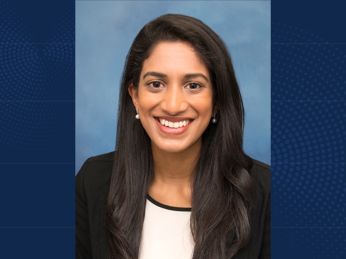 Headshot of Pratyusha Yalamanchi MD on a navy blue background