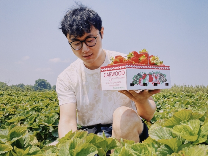 Yiqun Wang at a local farm