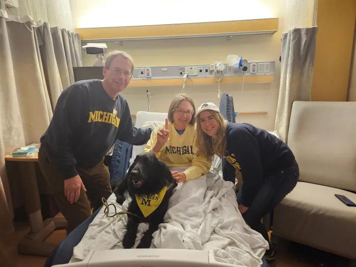 The Achtenberg family dressed in Michigan gear at University Hospital.