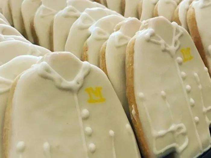 Photo of cookies shaped like white lab coats