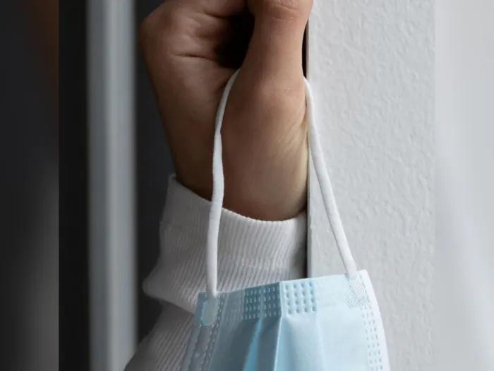 mask being held