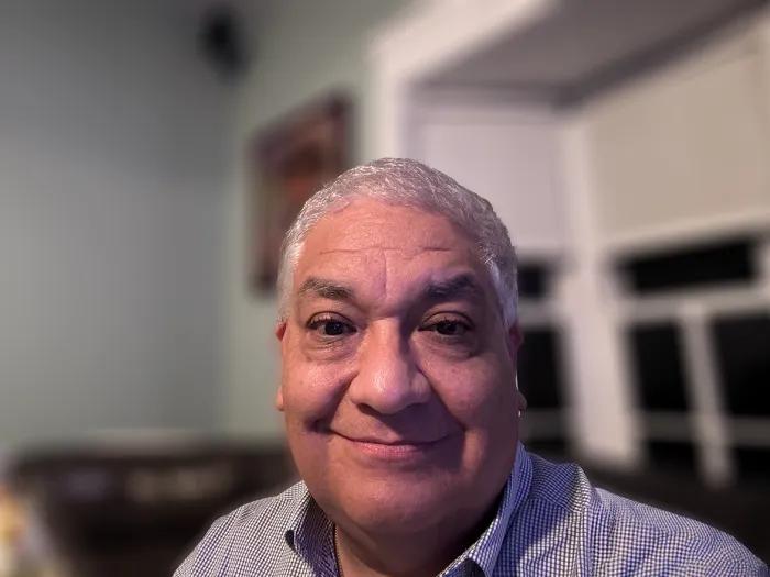 Smiling headshot of Juan Alejos, M.D.