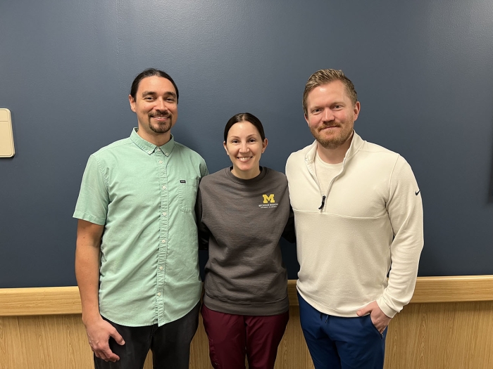 Smiling group shot of three Department of Radiation Oncology staff.