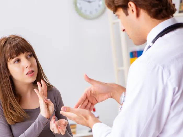 Doctor and patient using sign language