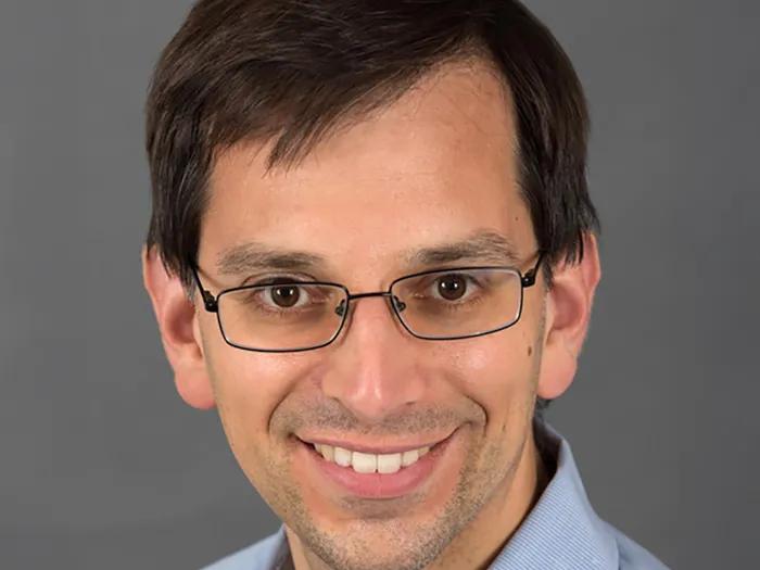 headshot of John R. Prensner