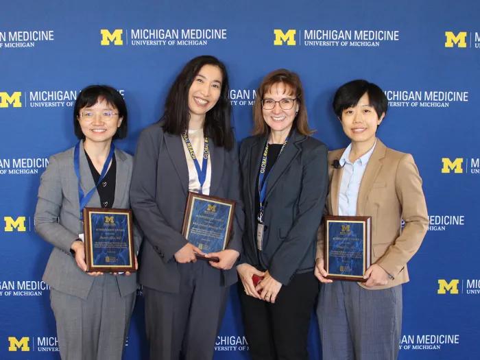 CMB Graduates and program lead Cheryl Moyer