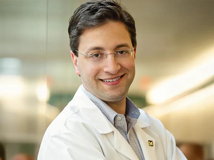 Dr Wassim Labaki headshot with AI generative fill background