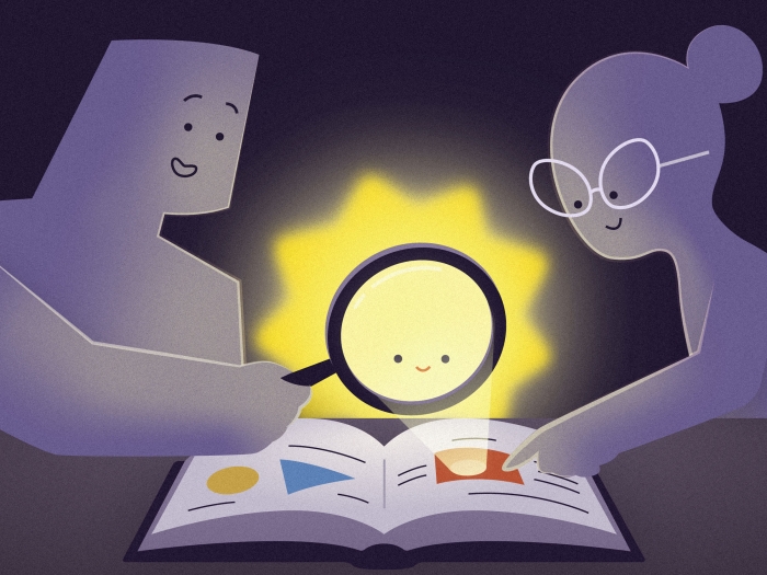 magnifier over book with two parents looking over it 