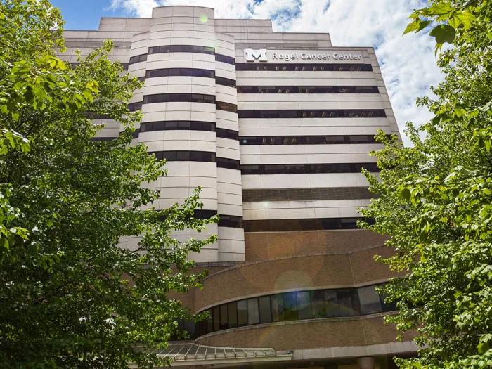 Rogel Cancer Center through trees
