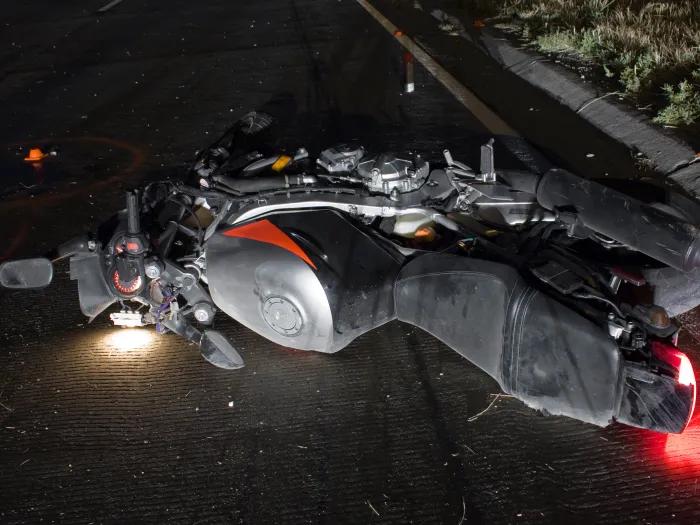 motorcycle on ground in street