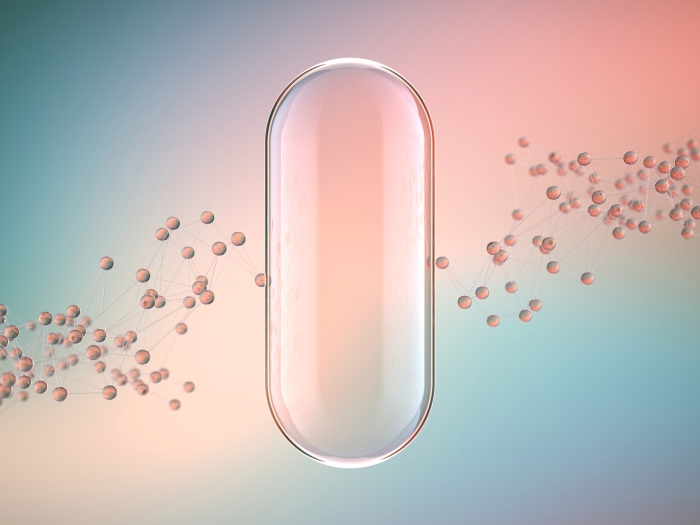 clear see through pill floating with other little pills behind in blue teal pink background