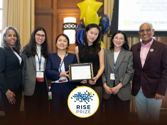 RISE Prize Award winners onstage at Michigan League. L-R: Paula Thompson, Sanjana Paye, Ashley Park, Rajesh Mangrulkar.