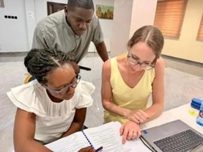 Sarah Compton with Ghanaian partners, co-leading a project launch workshop