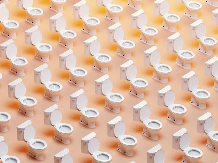 bathroom toliets pattern and orange background