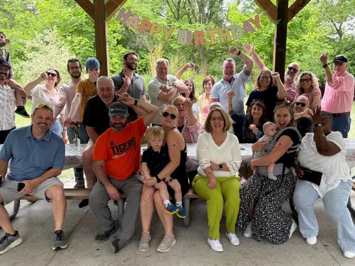 family together celebrating birthday