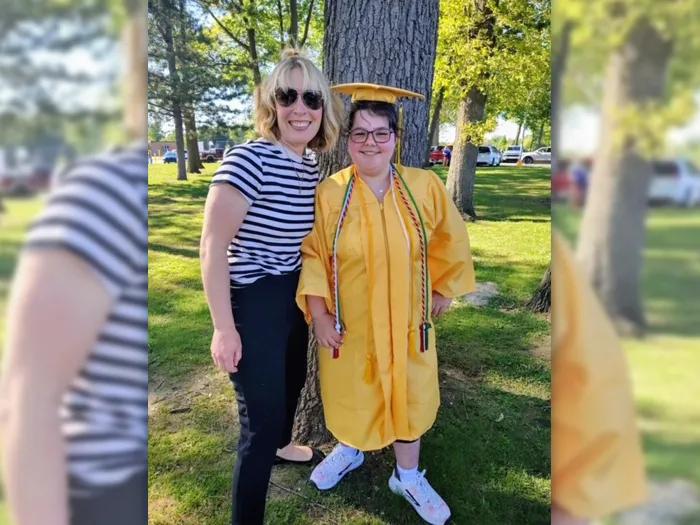 Elyse celebrates her high school graduation with VanWasshenova 