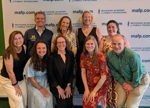 Large group of Department of Family Medicine faculty members at the Michigan Academy of Family Physicians annual meeting.