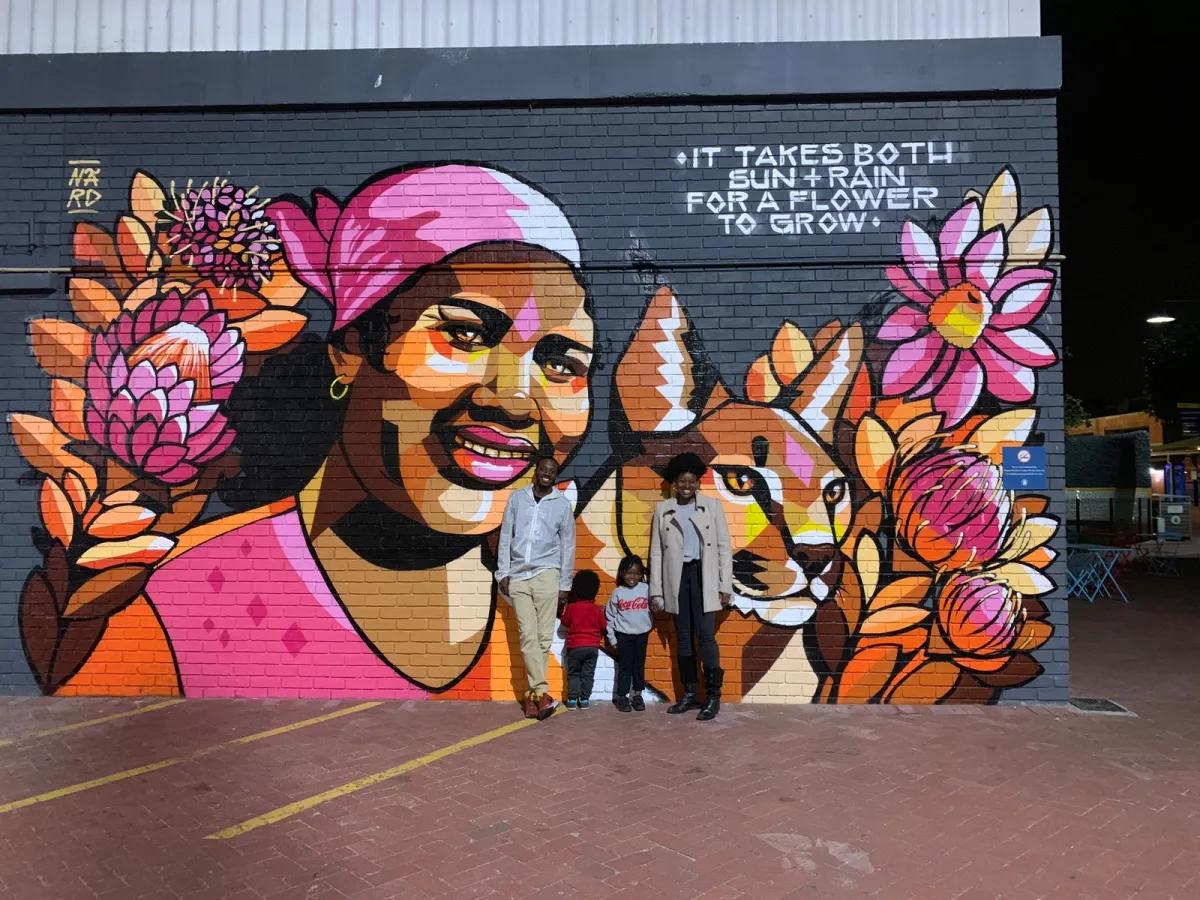 Dr. Parker and her family in South Africa, by a quote that inspired Dr. Parker throughout her journey.