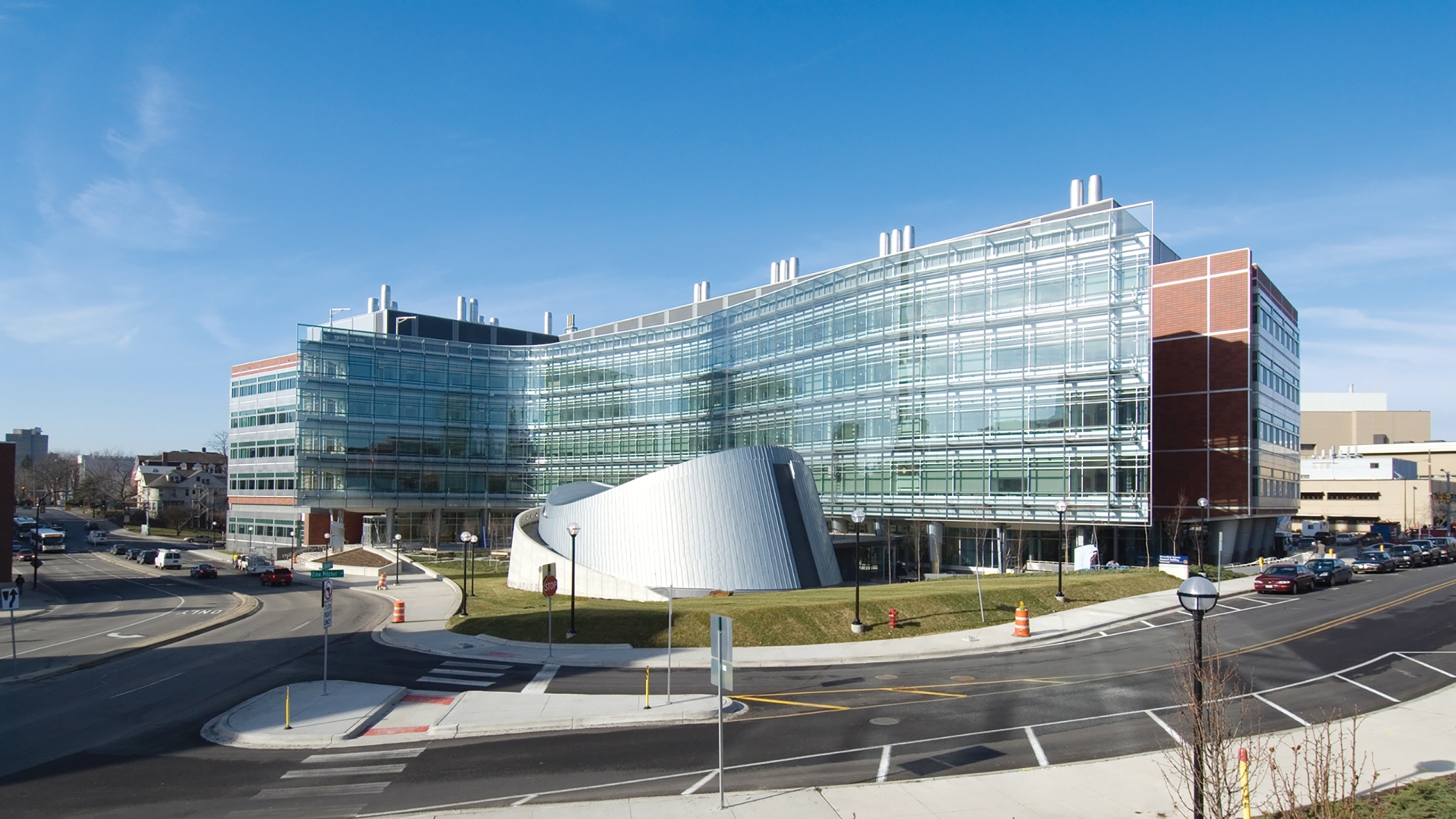 exterior shot of biomedical sciences research building including the auditorium that looks like a pringle
