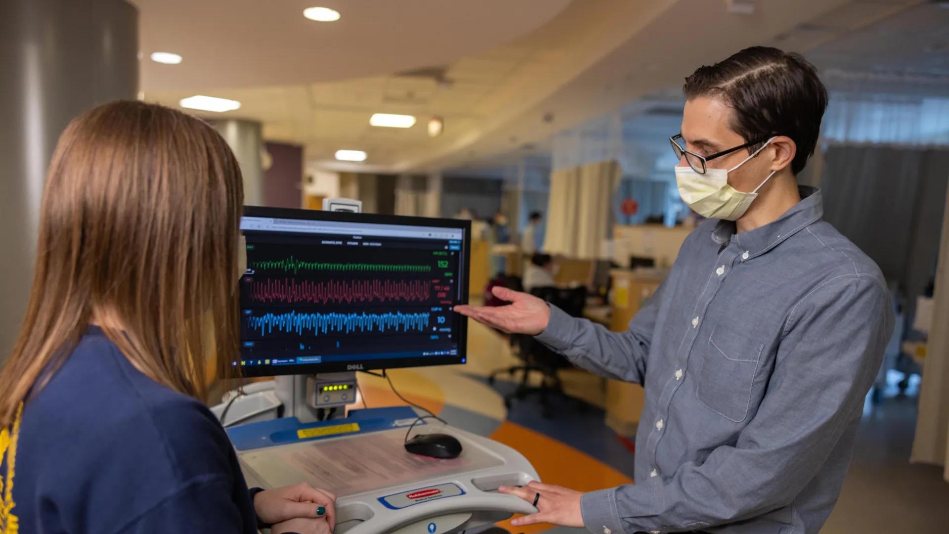 Doctor reading scans in the pediatric unit 