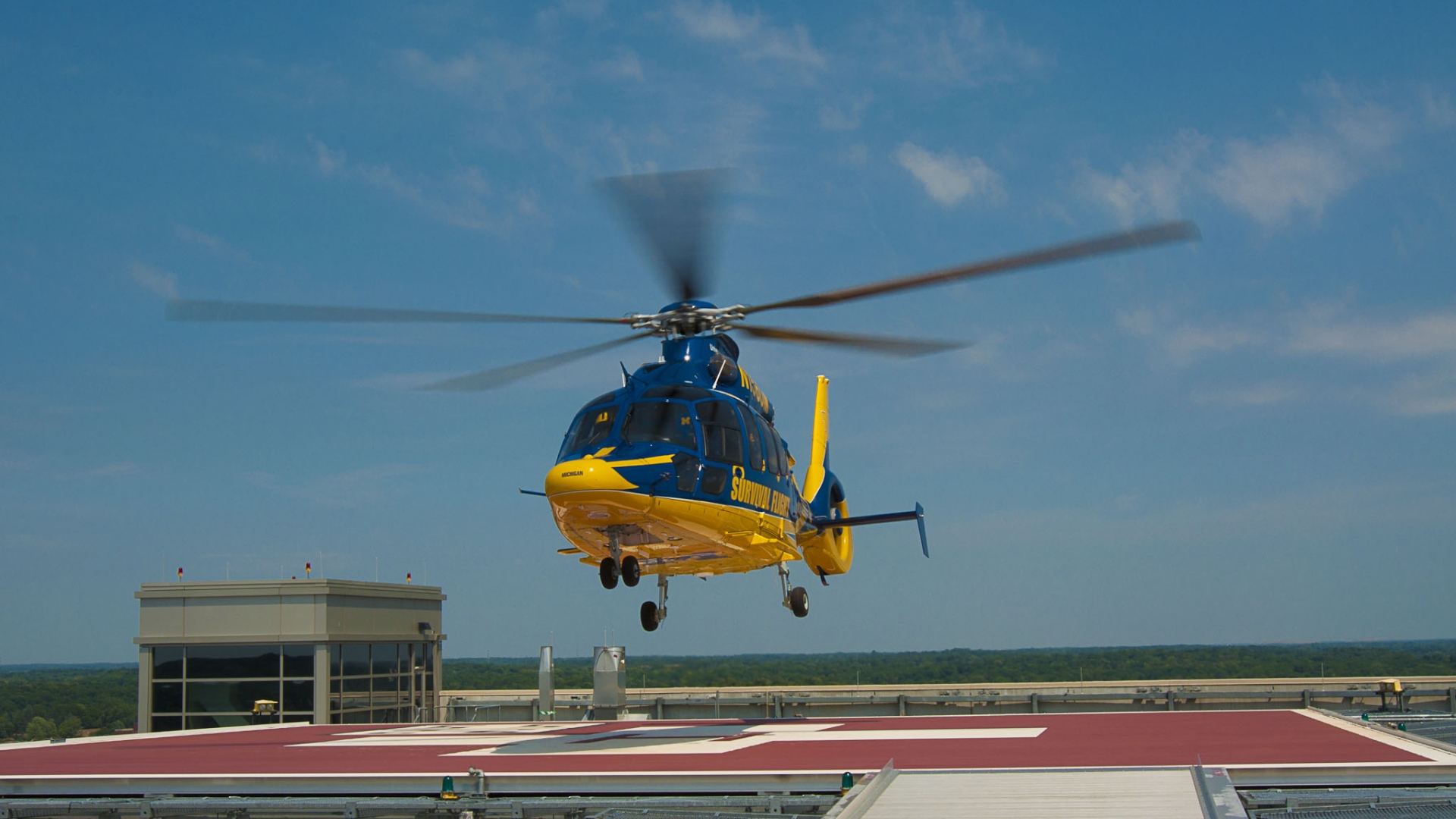 survival flight helicopter landing on the helipad 