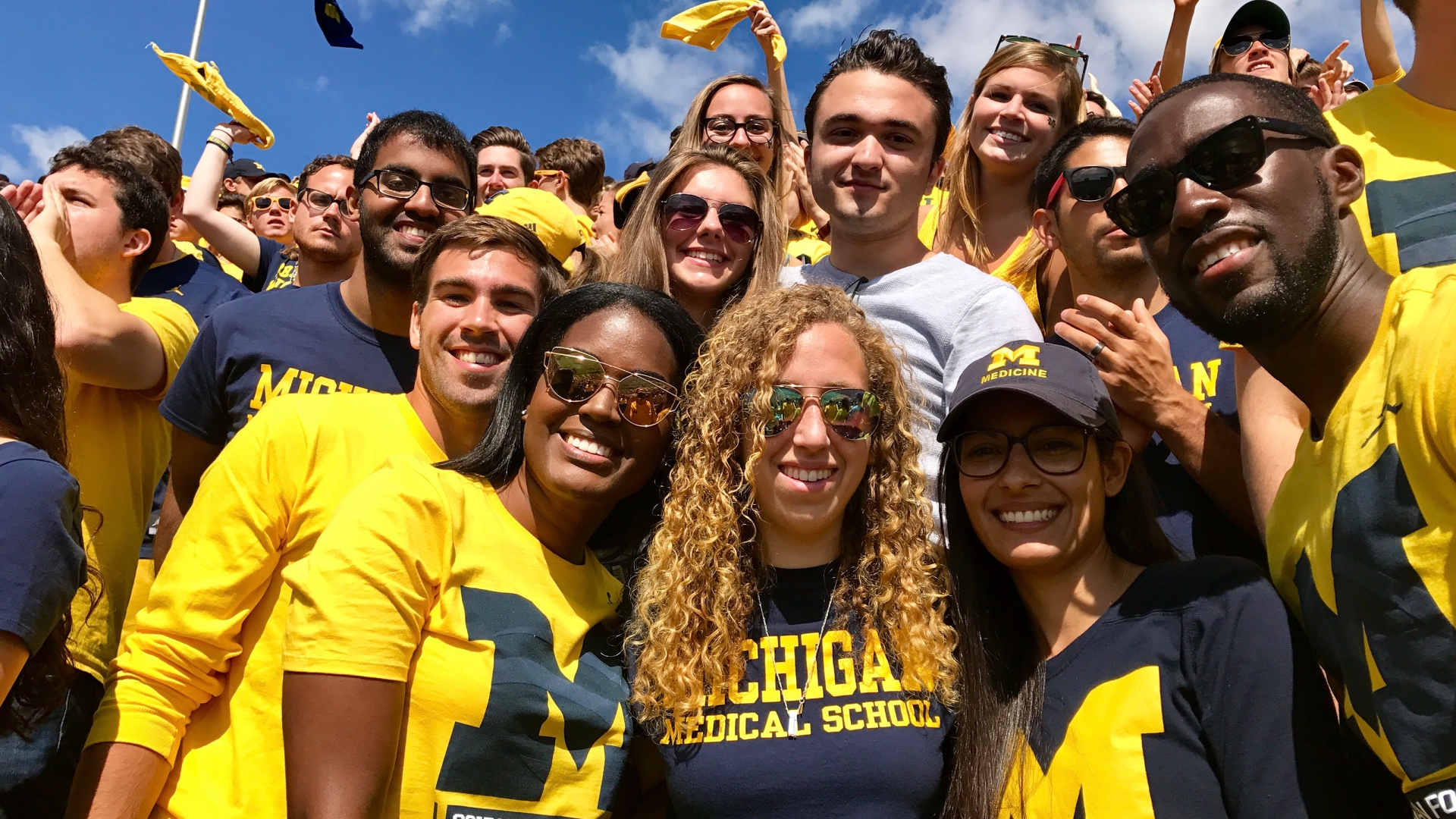 Students celebrating at a Michigan game